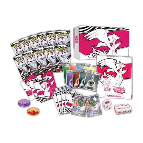 Collection of trading cards and game components on a white background